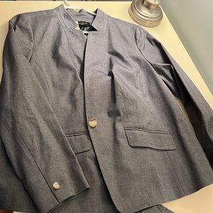 Two piece grey, Talbots suit. Made of cotton and spandex, size 16 W.